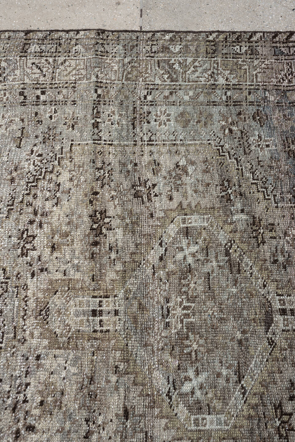 5' x 6' one-of-a-kind handmade antique Shiraz rug. Color palette: taupe, ivory, charcoal, blue gray, brown, slate, beige