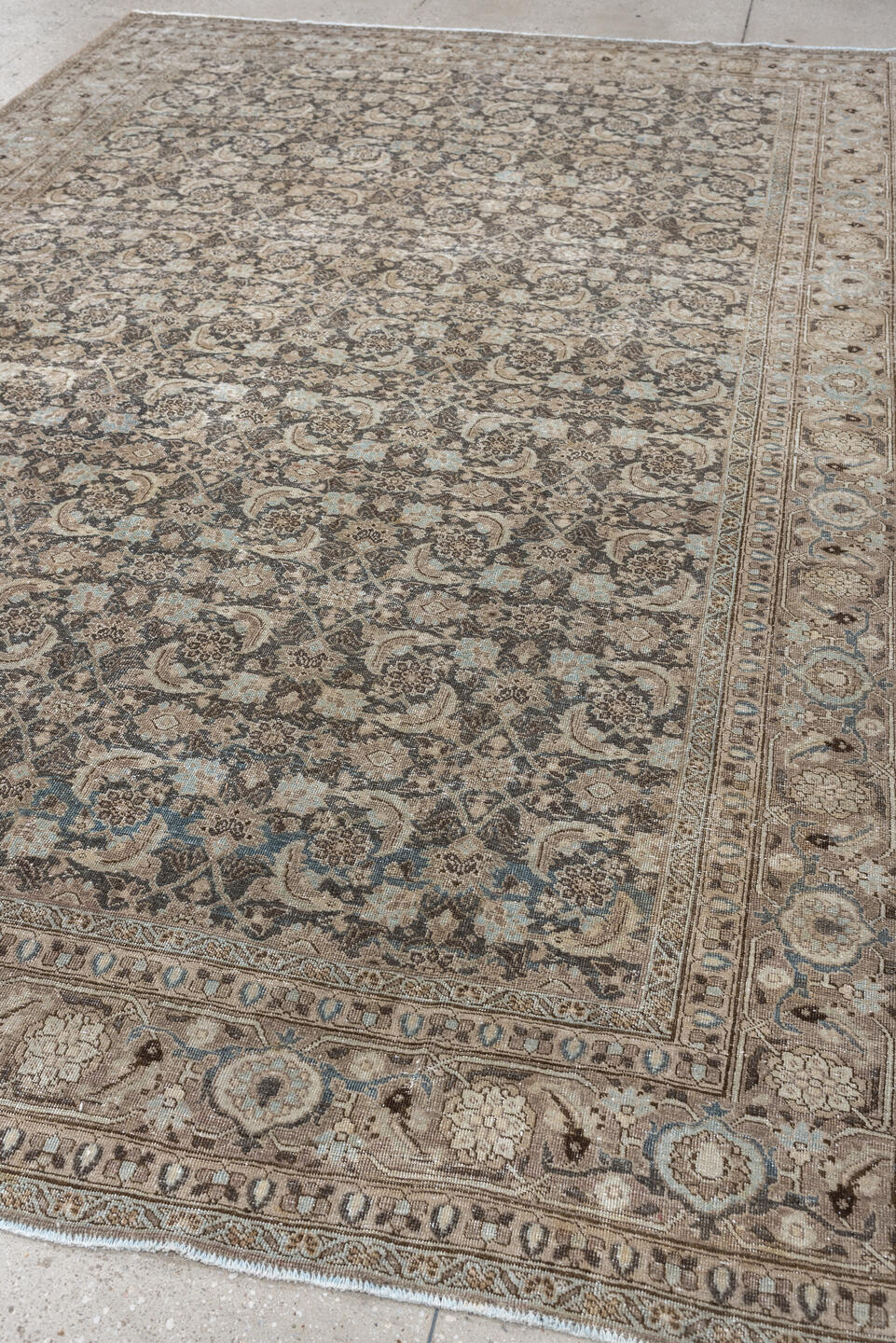 7' x 10' one-of-a-kind handmade antique Tabriz large size rug. Color palette: taupe, ivory, charcoal, pale blue, brown