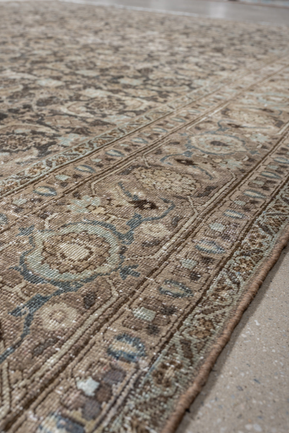 7' x 10' one-of-a-kind handmade antique Tabriz large size rug. Color palette: taupe, ivory, charcoal, pale blue, brown