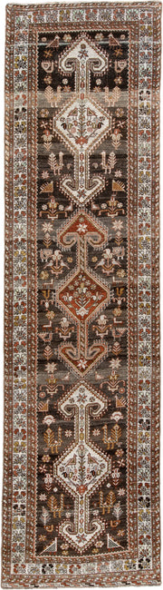 3' x 12' one-of-a-kind handmade antique Shiraz runner rug. Color palette: dark brown, ivory, rust, terra cotta, charcoal