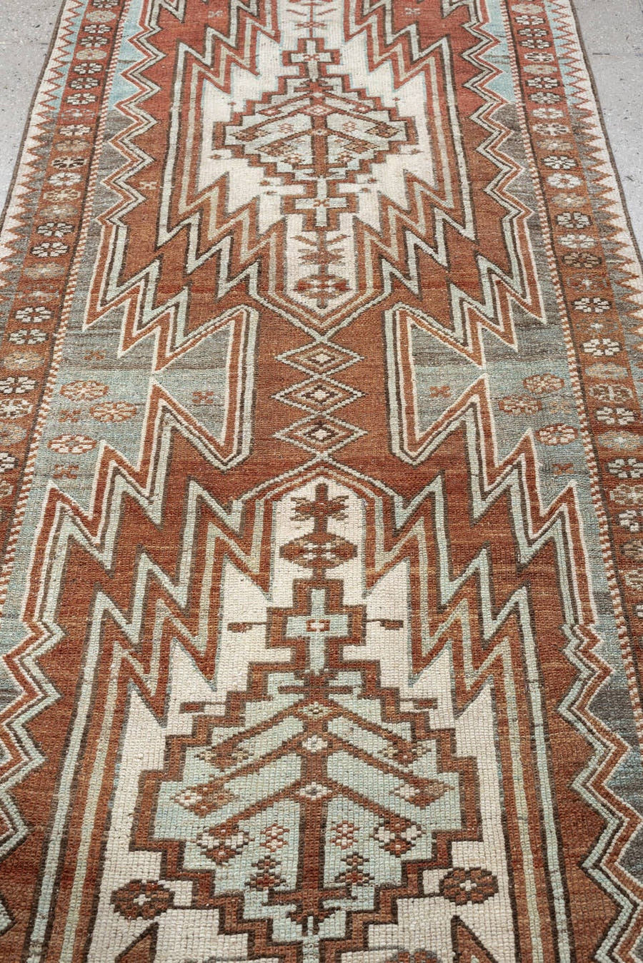 3' x 9' one-of-a-kind handmade antique Mazlagan runner rug. Color palette: rust, ivory, pale blue gray, terracotta, charcoal
