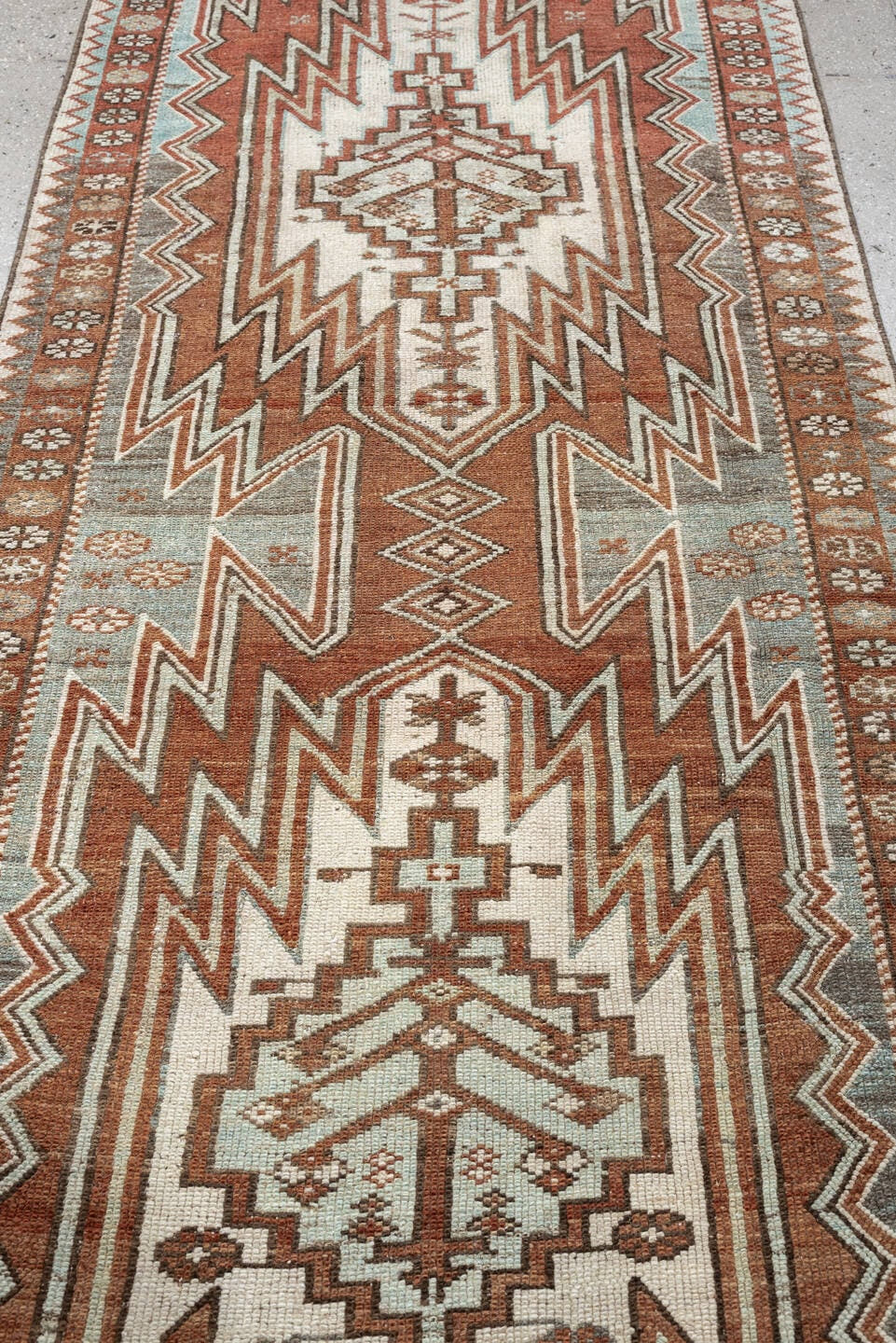 3' x 9' one-of-a-kind handmade antique Mazlagan runner rug. Color palette: rust, ivory, pale blue gray, terracotta, charcoal