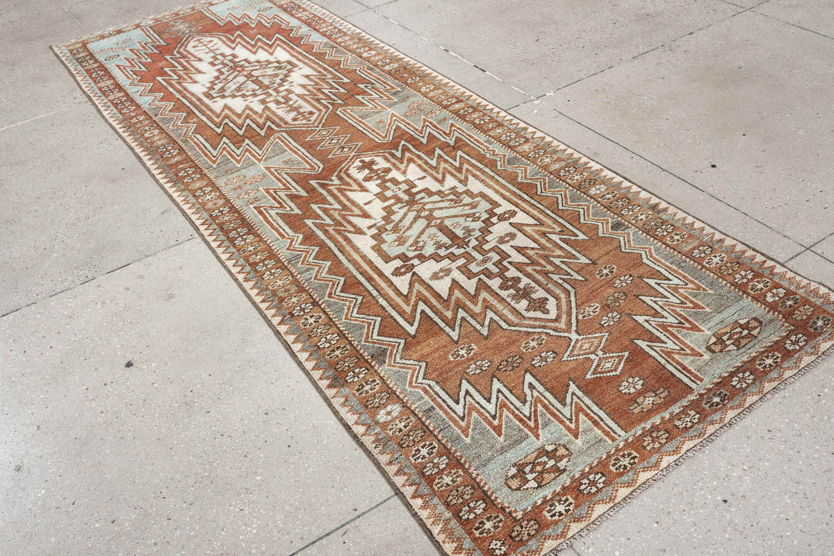 3' x 9' one-of-a-kind handmade antique Mazlagan runner rug. Color palette: rust, ivory, pale blue gray, terracotta, charcoal
