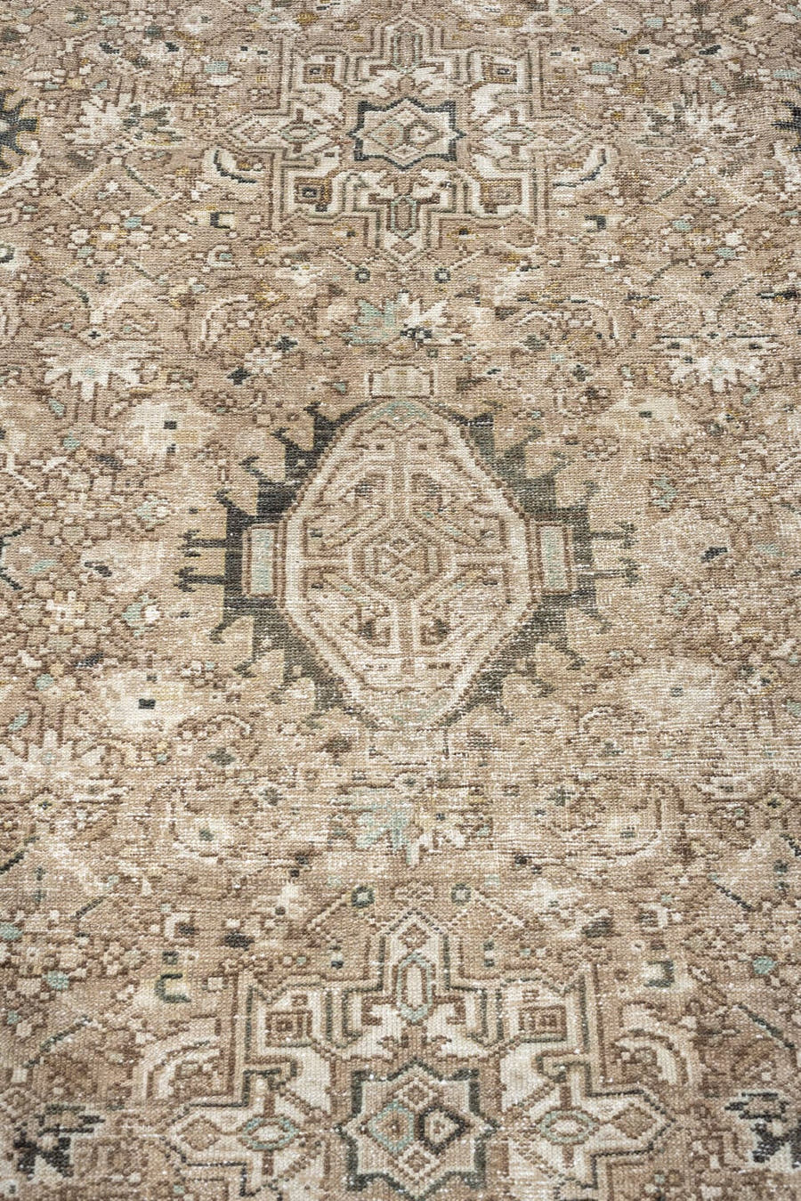 7' x 10' one-of-a-kind handmade antique Karaje large size rug. Color palette: taupe, ivory, charcoal, camel, sage, slate