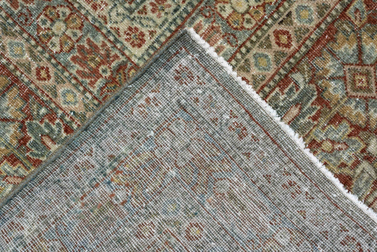 10' x 15' one-of-a-kind handmade antique Tabriz rug. Color palette: sage, ivory, terracotta, charcoal, taupe, coral