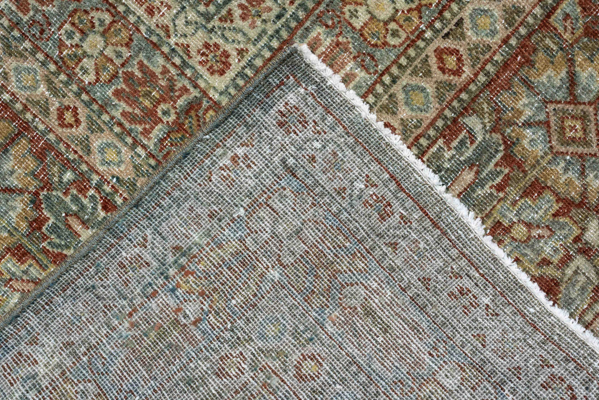10' x 15' one-of-a-kind handmade antique Tabriz rug. Color palette: sage, ivory, terracotta, charcoal, taupe, coral