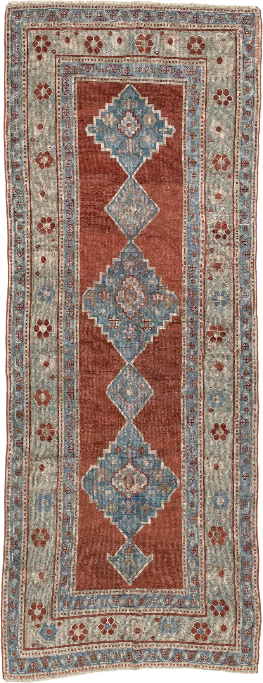 4' x 10' one-of-a-kind handmade vintage runner rug. Color palette: rust, powder blue, ivory, taupe, terracotta, slate blue