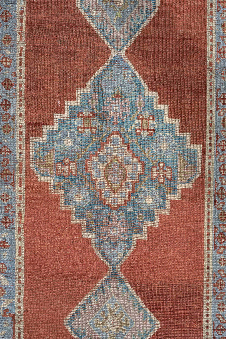 4' x 10' one-of-a-kind handmade vintage runner rug. Color palette: rust, powder blue, ivory, taupe, terracotta, slate blue