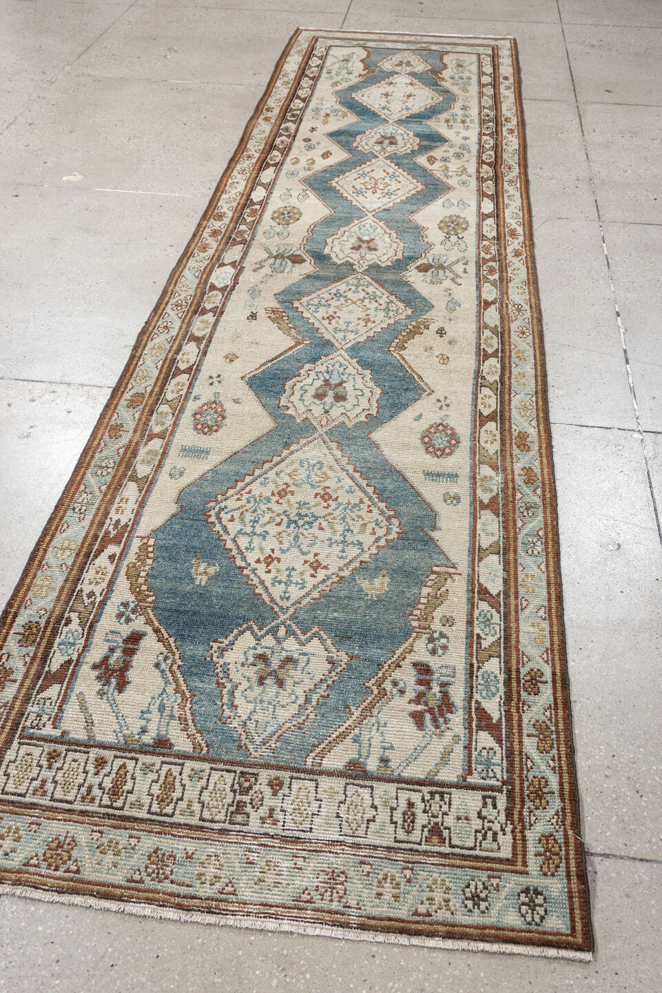 3' x 12' one-of-a-kind handmade antique NW Persian runner rug. Color palette: ivory, soft blue, rust, camel, taupe, sage