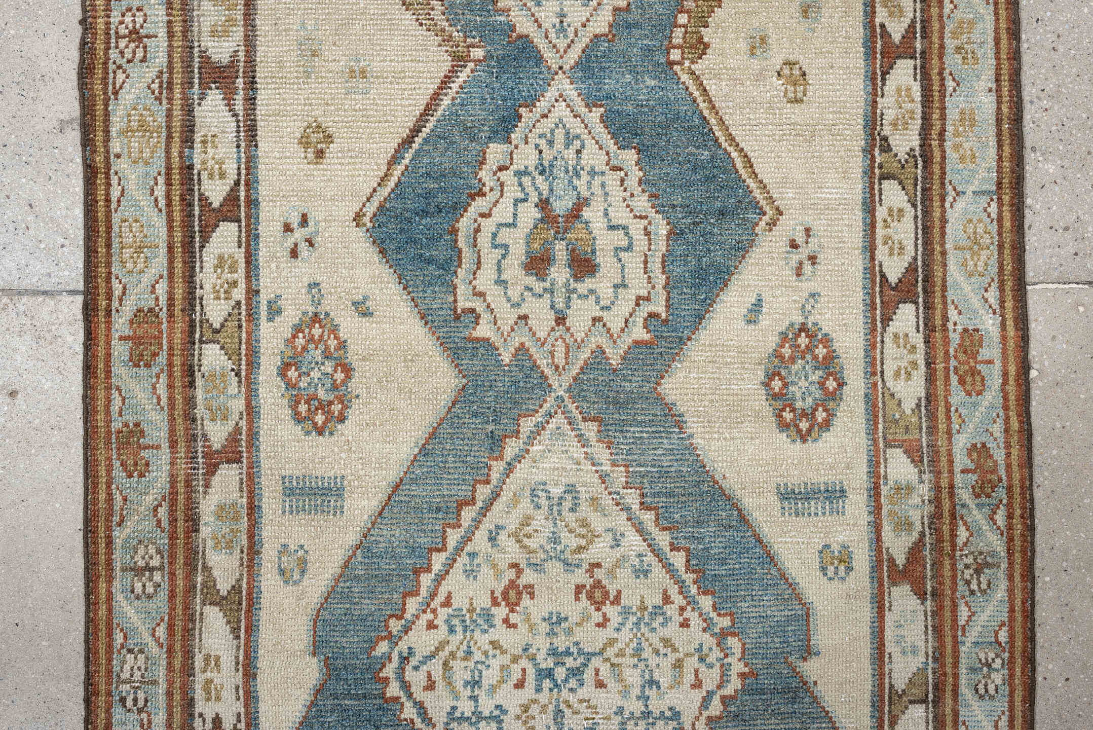 3' x 12' one-of-a-kind handmade antique NW Persian runner rug. Color palette: ivory, soft blue, rust, camel, taupe, sage