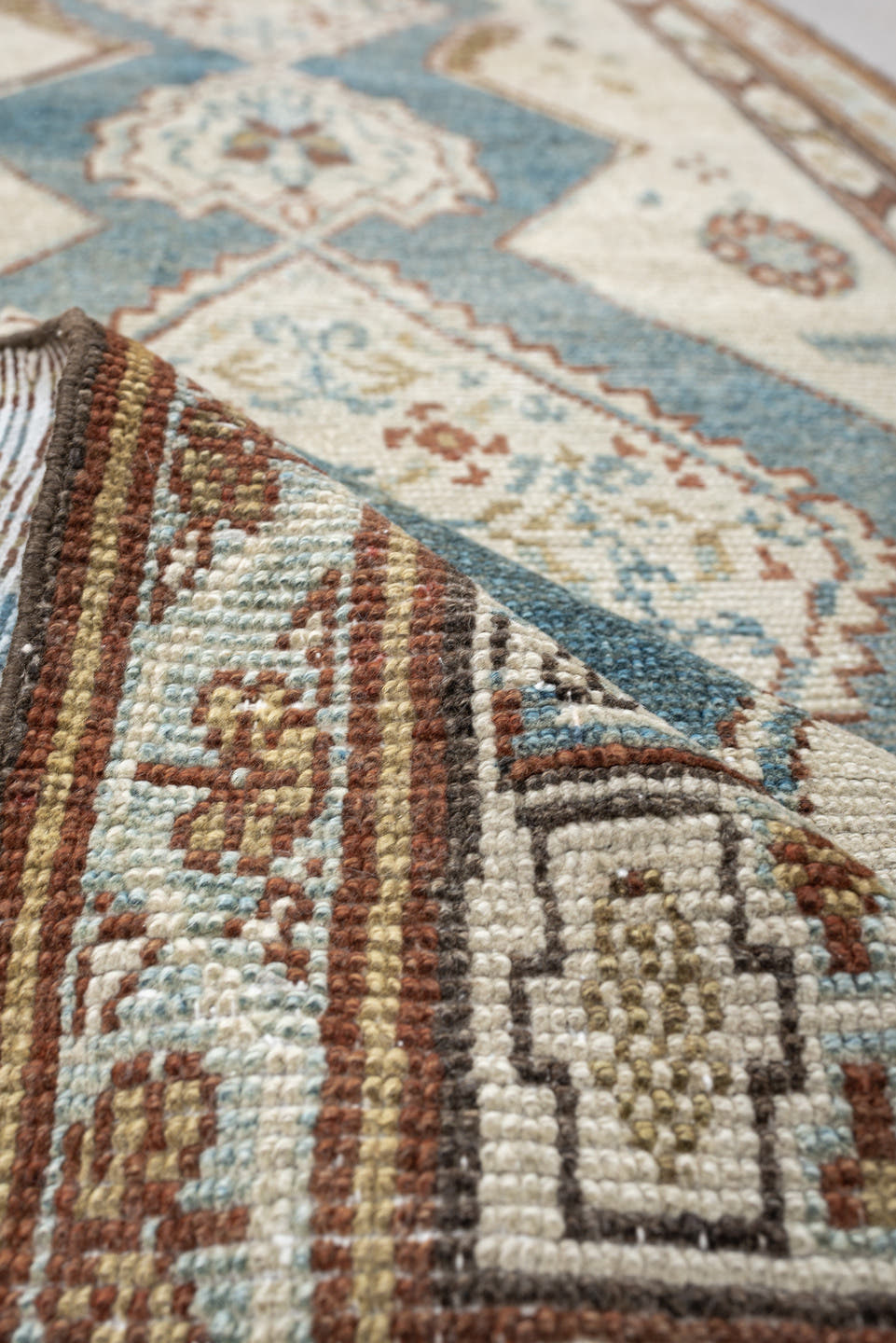 3' x 12' one-of-a-kind handmade antique NW Persian runner rug. Color palette: ivory, soft blue, rust, camel, taupe, sage