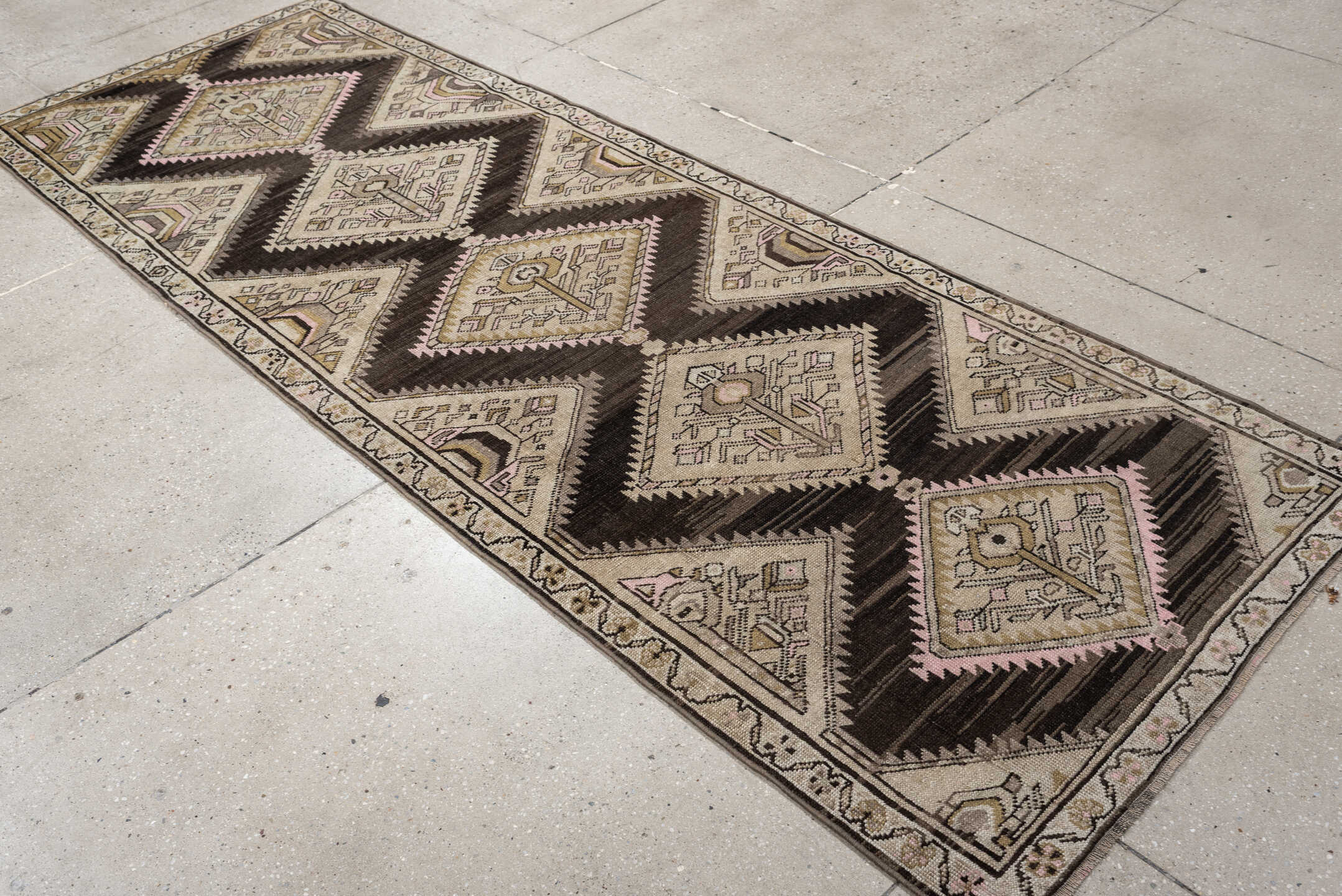 3' x 9' one-of-a-kind handmade antique NW Persian runner rug. Color palette: dark brown, ivory, taupe, blush pink, camel