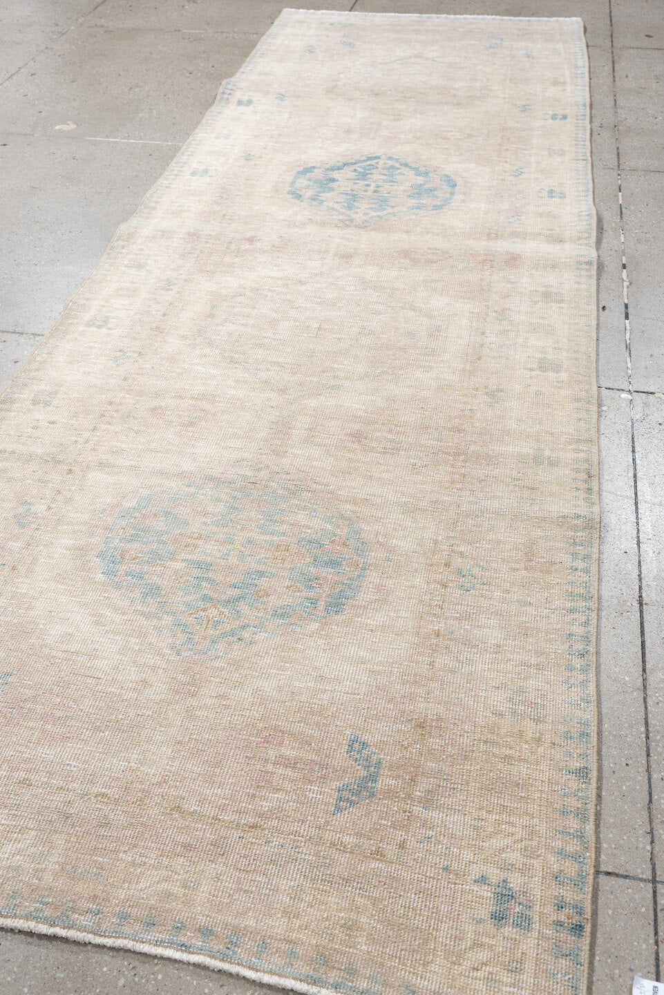 3' x 10' one-of-a-kind handmade antique Sarab runner rug. Color palette: ivory, pale blue, blush, beige, taupe, light blue