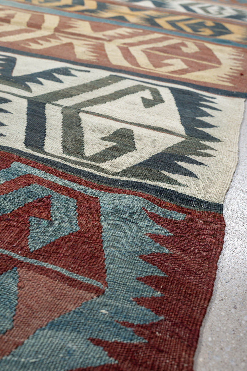 5' x 12' one-of-a-kind handmade antique Kilim large size rug. Color palette: camel, ivory, teal, rust, charcoal, terra cotta