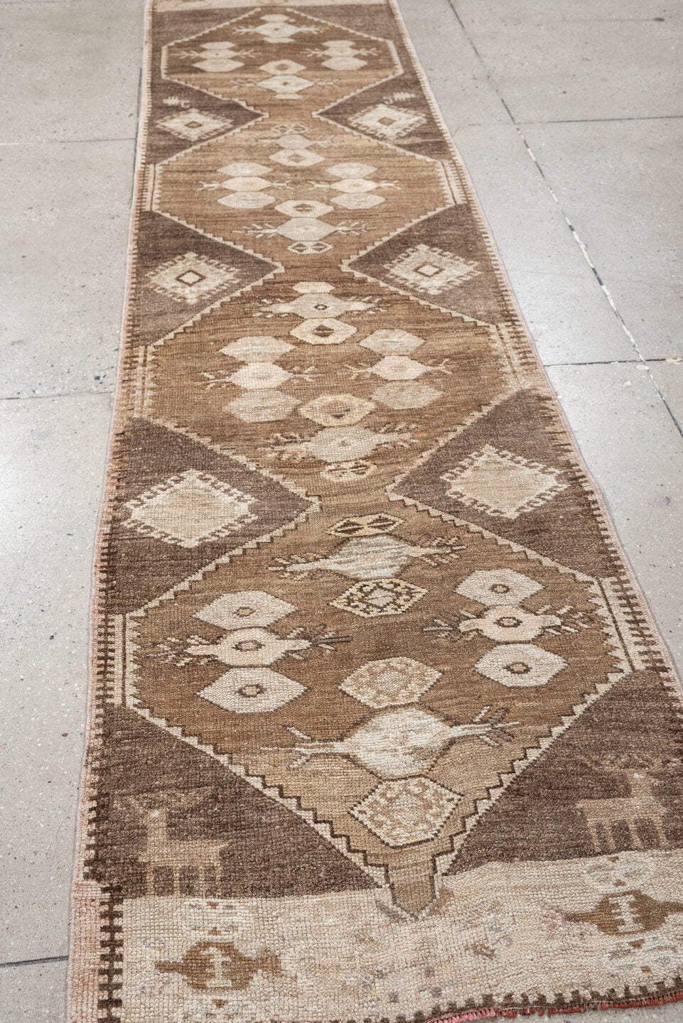 2' x 10' one-of-a-kind handmade antique Kars runner rug. Color palette: taupe, camel, brown, ivory, cream, beige, gray