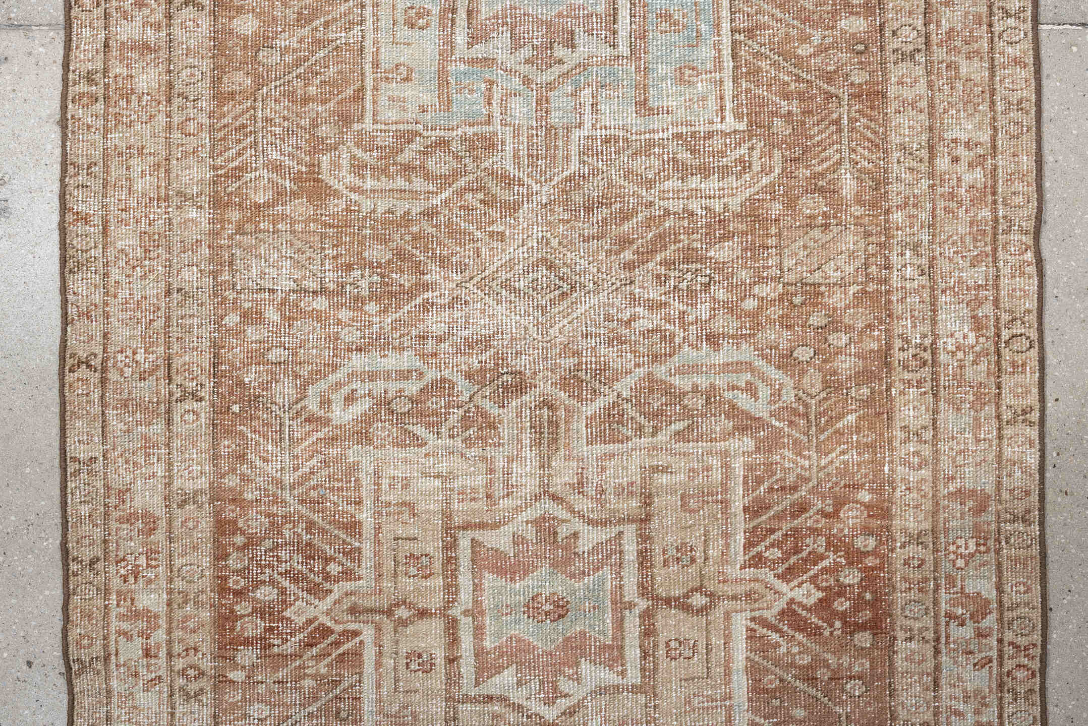 3' x 12' one-of-a-kind handmade vintage Heriz runner rug. Color palette: blush, ivory, pale blue, taupe, camel, pink