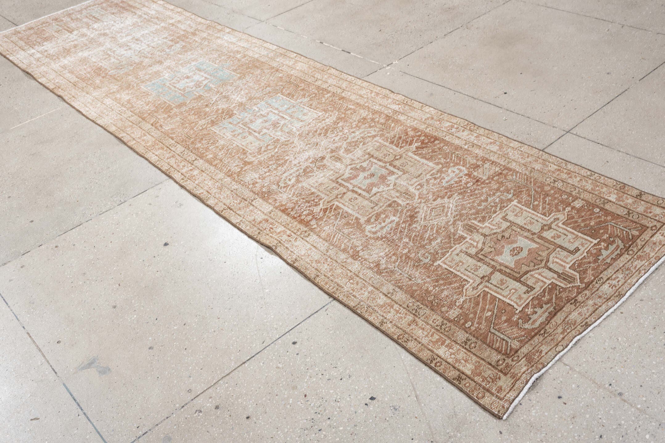3' x 12' one-of-a-kind handmade vintage Heriz runner rug. Color palette: blush, ivory, pale blue, taupe, camel, pink