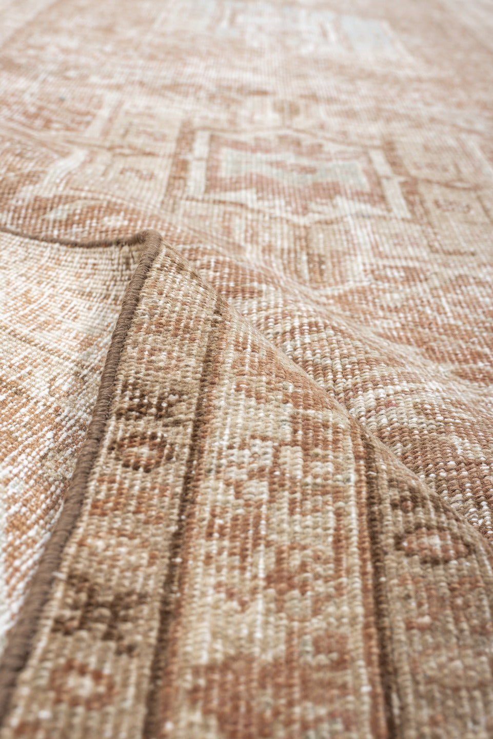 3' x 12' one-of-a-kind handmade vintage Heriz runner rug. Color palette: blush, ivory, pale blue, taupe, camel, pink