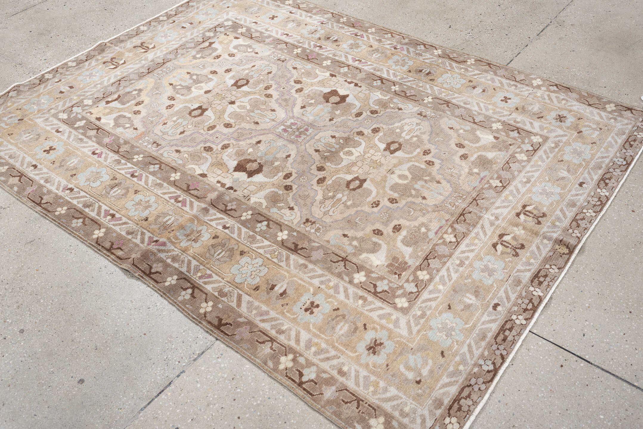 4' x 6' one-of-a-kind handmade antique Sivas rug. Color palette: ivory, taupe, camel, pale blue, soft brown, beige, lavender