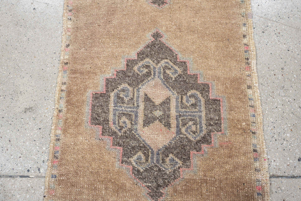 1' x 3' one-of-a-kind handmade vintage Oushak small size rug. Color palette: camel, taupe, charcoal, ivory, faded rose