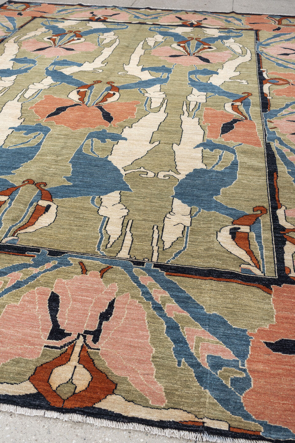 9' x 12' one-of-a-kind handmade vintage Afghan large size rug. Color palette: sage, salmon pink, ivory, blue gray, navy