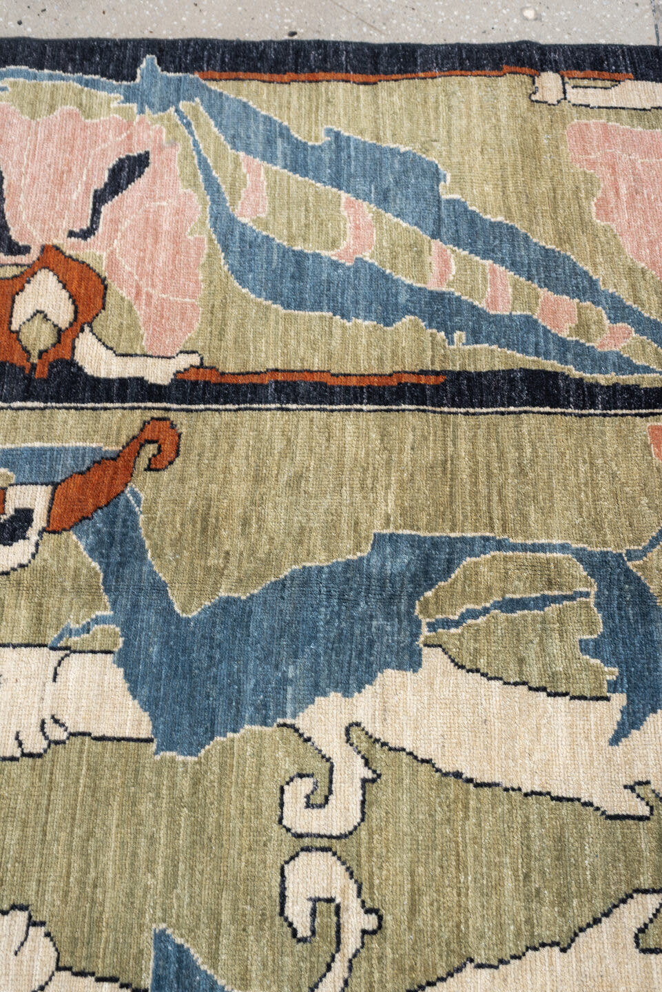 9' x 12' one-of-a-kind handmade vintage Afghan large size rug. Color palette: sage, salmon pink, ivory, blue gray, navy