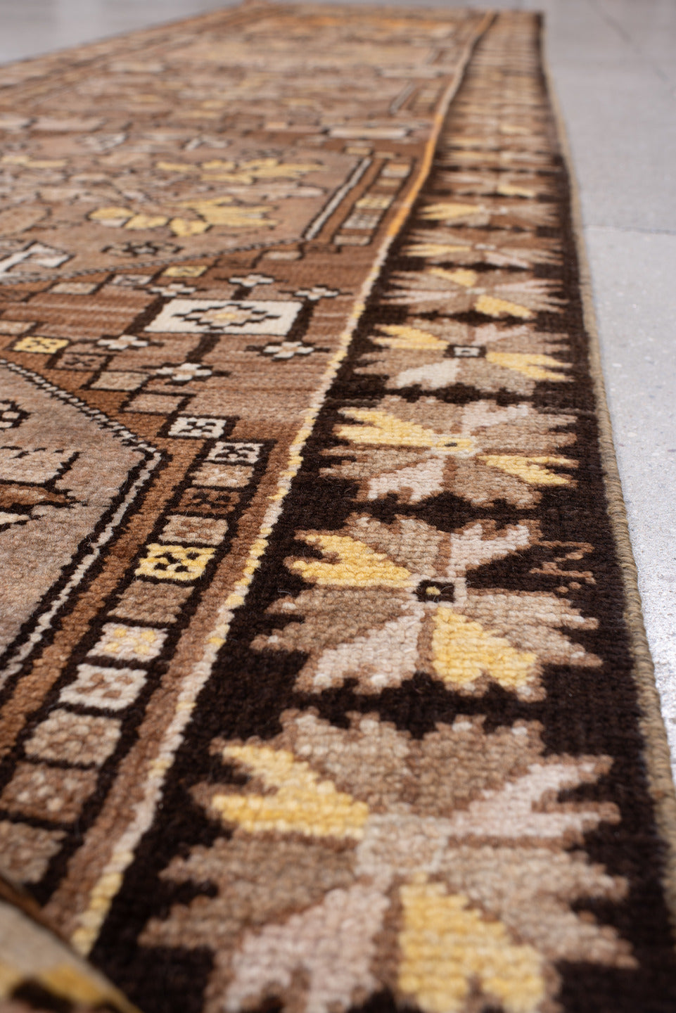 2' x 13' one-of-a-kind handmade antique Anatolian runner rug. Color palette: camel, brown, ivory, saffron, taupe, rose