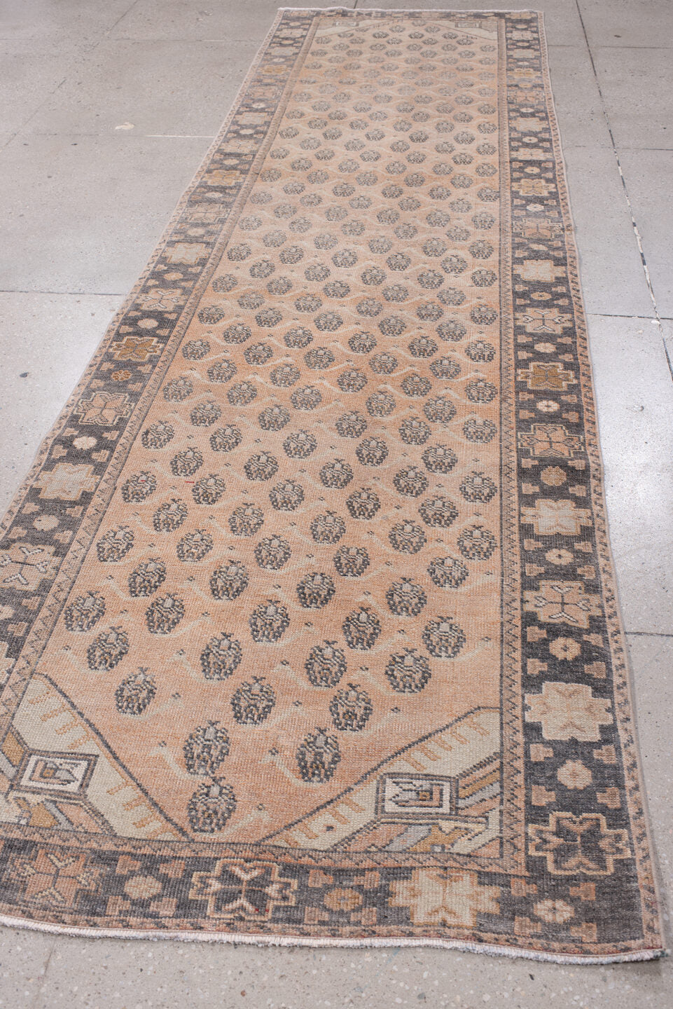 3' x 12' one-of-a-kind handmade antique Anatolian runner rug. Color palette: camel, charcoal, ivory, taupe, tan, slate