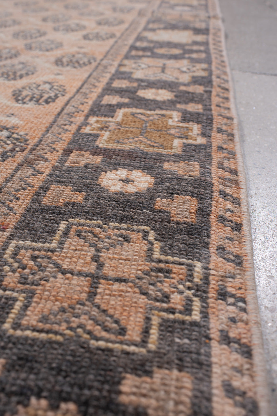 3' x 12' one-of-a-kind handmade antique Anatolian runner rug. Color palette: camel, charcoal, ivory, taupe, tan, slate