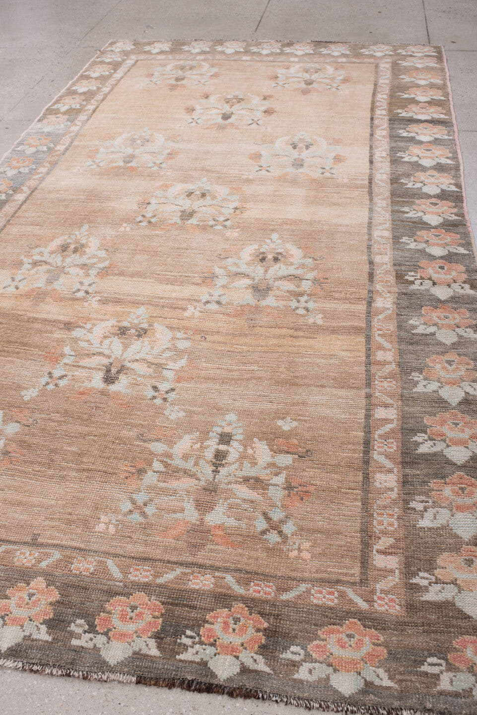 5' x 11' one-of-a-kind handmade antique Anatolian large size rug. Color palette: taupe, charcoal, blush, ivory, peach, sage