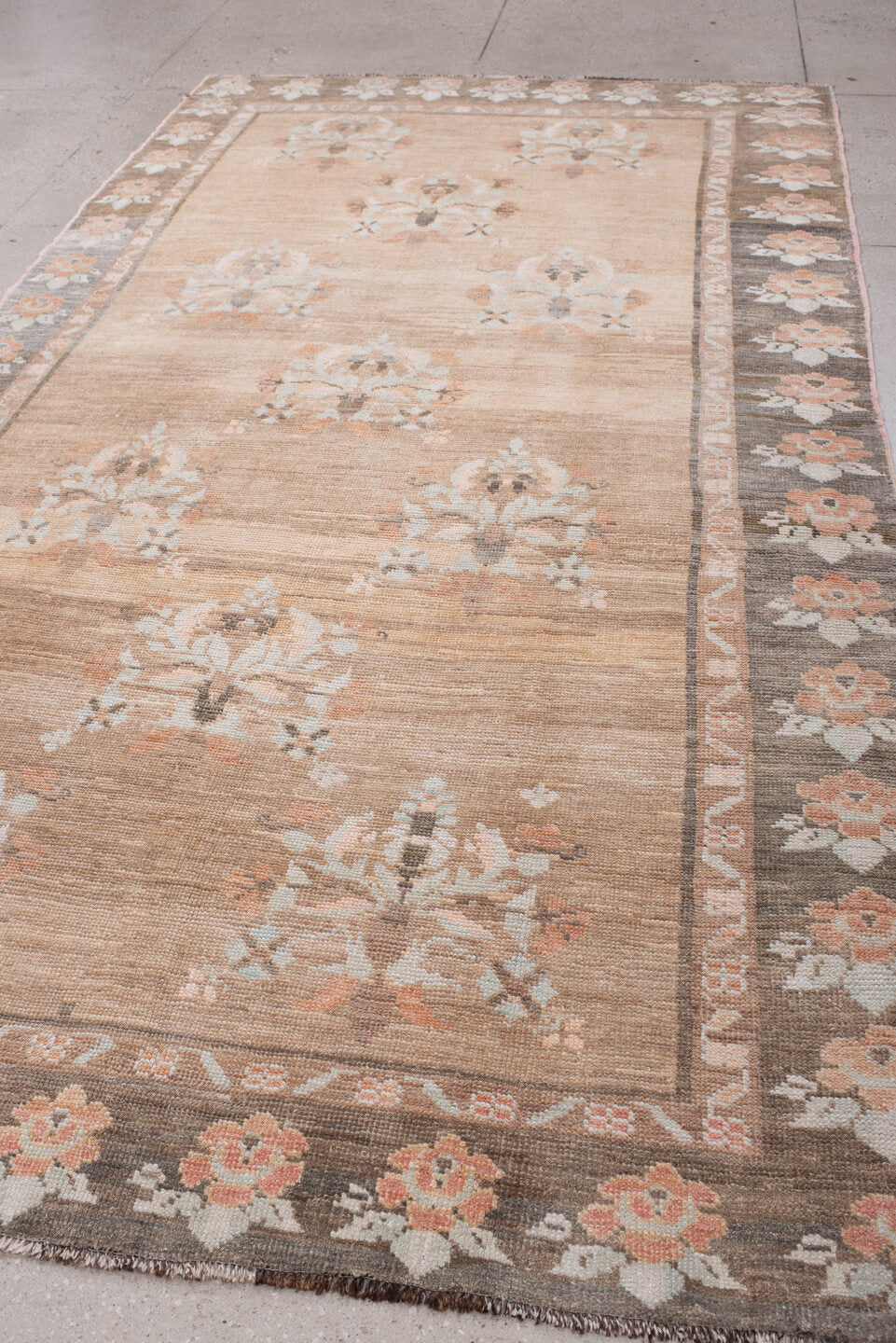 5' x 11' one-of-a-kind handmade antique Anatolian large size rug. Color palette: taupe, charcoal, blush, ivory, peach, sage