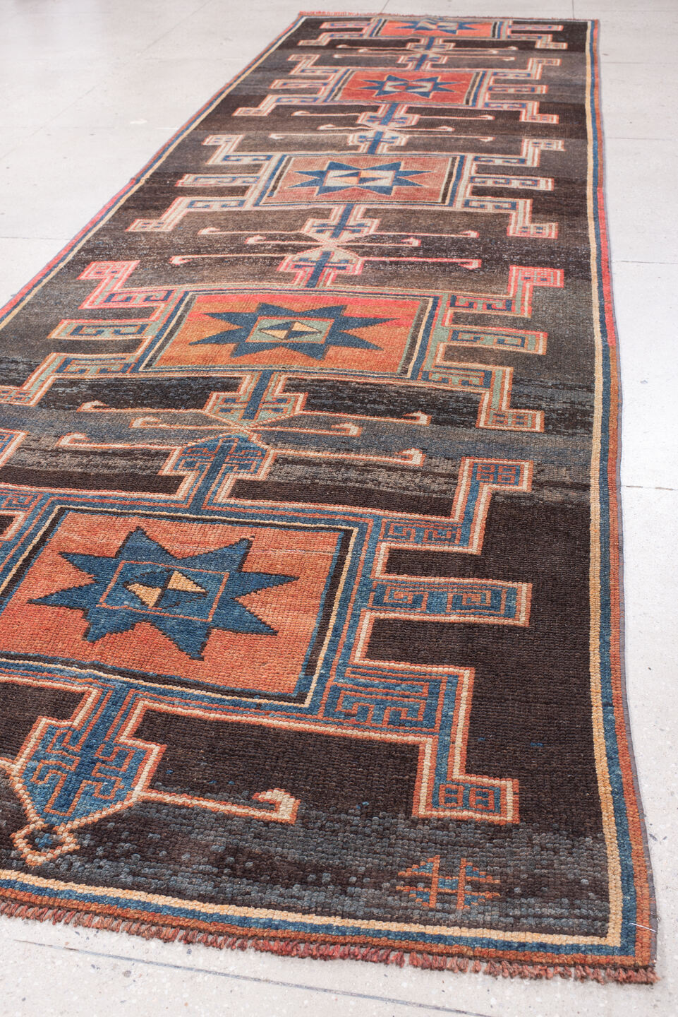 4' x 15' one-of-a-kind handmade antique Kars runner rug. Color palette: charcoal, rust, teal, ivory, terracotta, coral