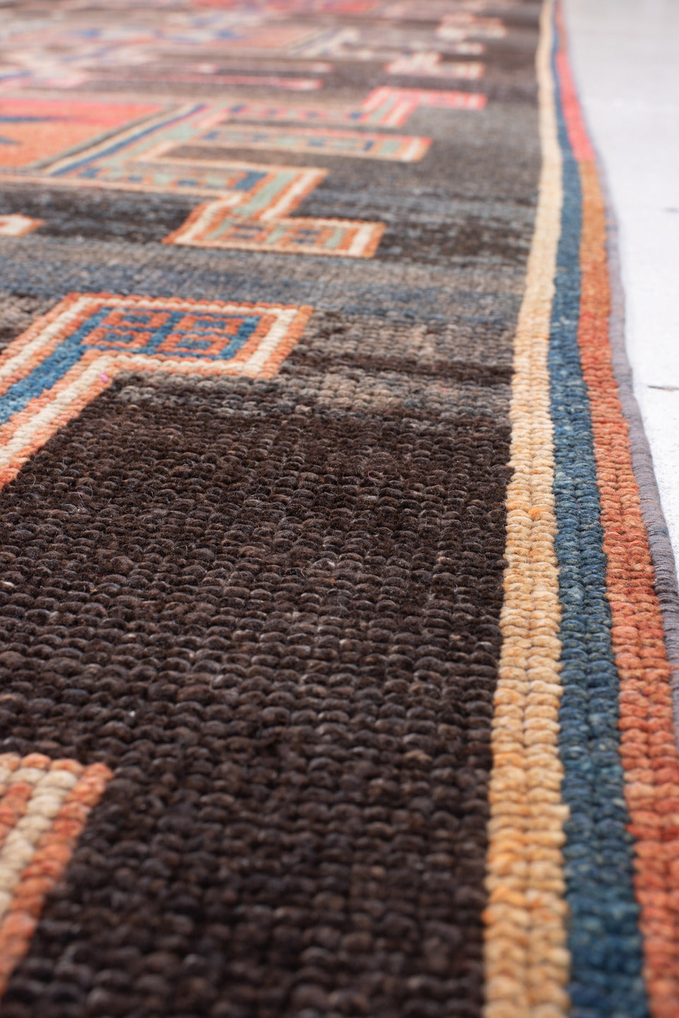4' x 15' one-of-a-kind handmade antique Kars runner rug. Color palette: charcoal, rust, teal, ivory, terracotta, coral