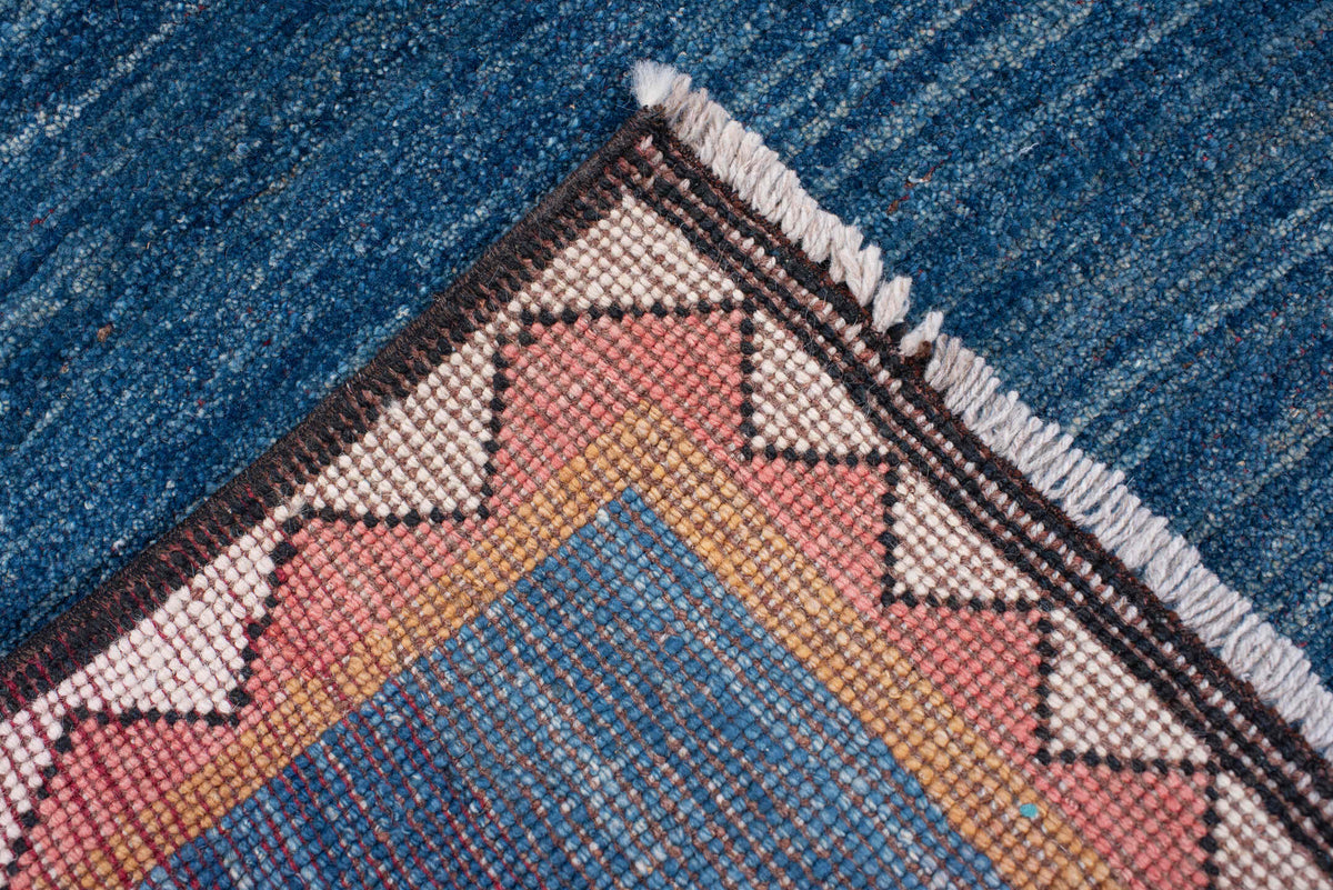 3' x 8' one-of-a-kind handmade antique Gabbe runner rug. Color palette: indigo, rust, ivory, blush, camel, charcoal, purple