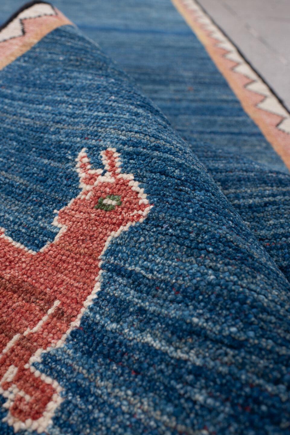 3' x 8' one-of-a-kind handmade antique Gabbe runner rug. Color palette: indigo, rust, ivory, blush, camel, charcoal, purple