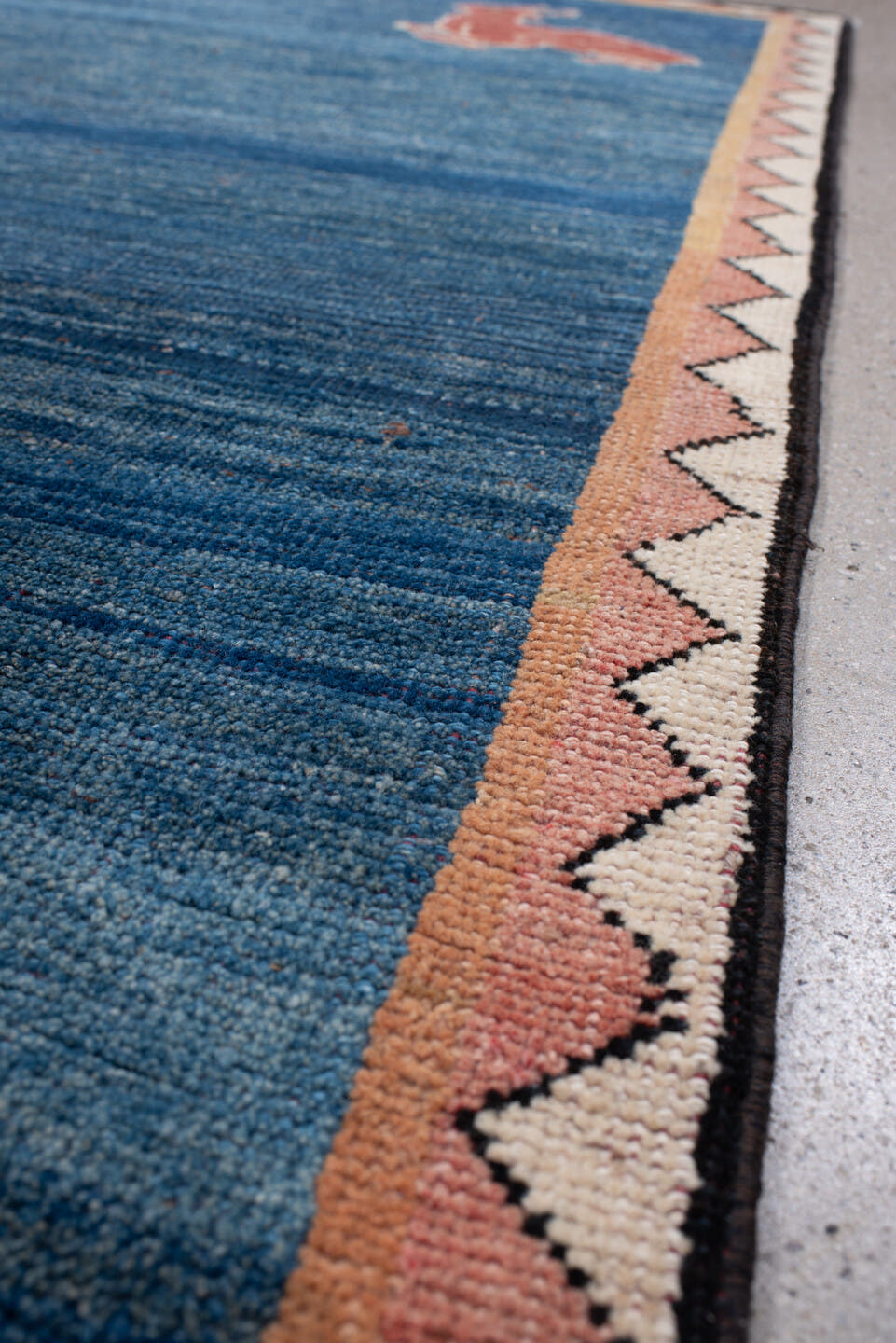 3' x 8' one-of-a-kind handmade antique Gabbe runner rug. Color palette: indigo, rust, ivory, blush, camel, charcoal, purple