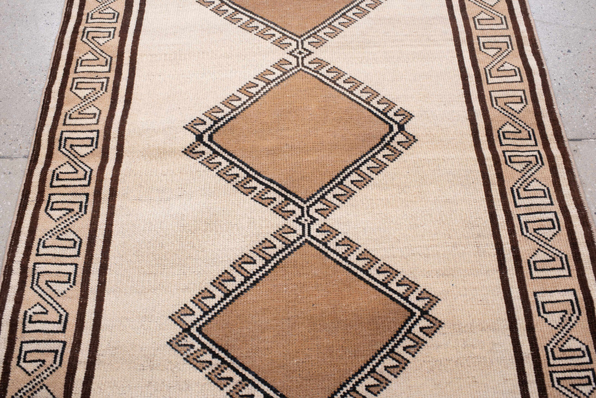 3' x 6' one-of-a-kind handmade antique Anatolian rug. Color palette: ivory, camel, dark brown, taupe, charcoal, beige, brown