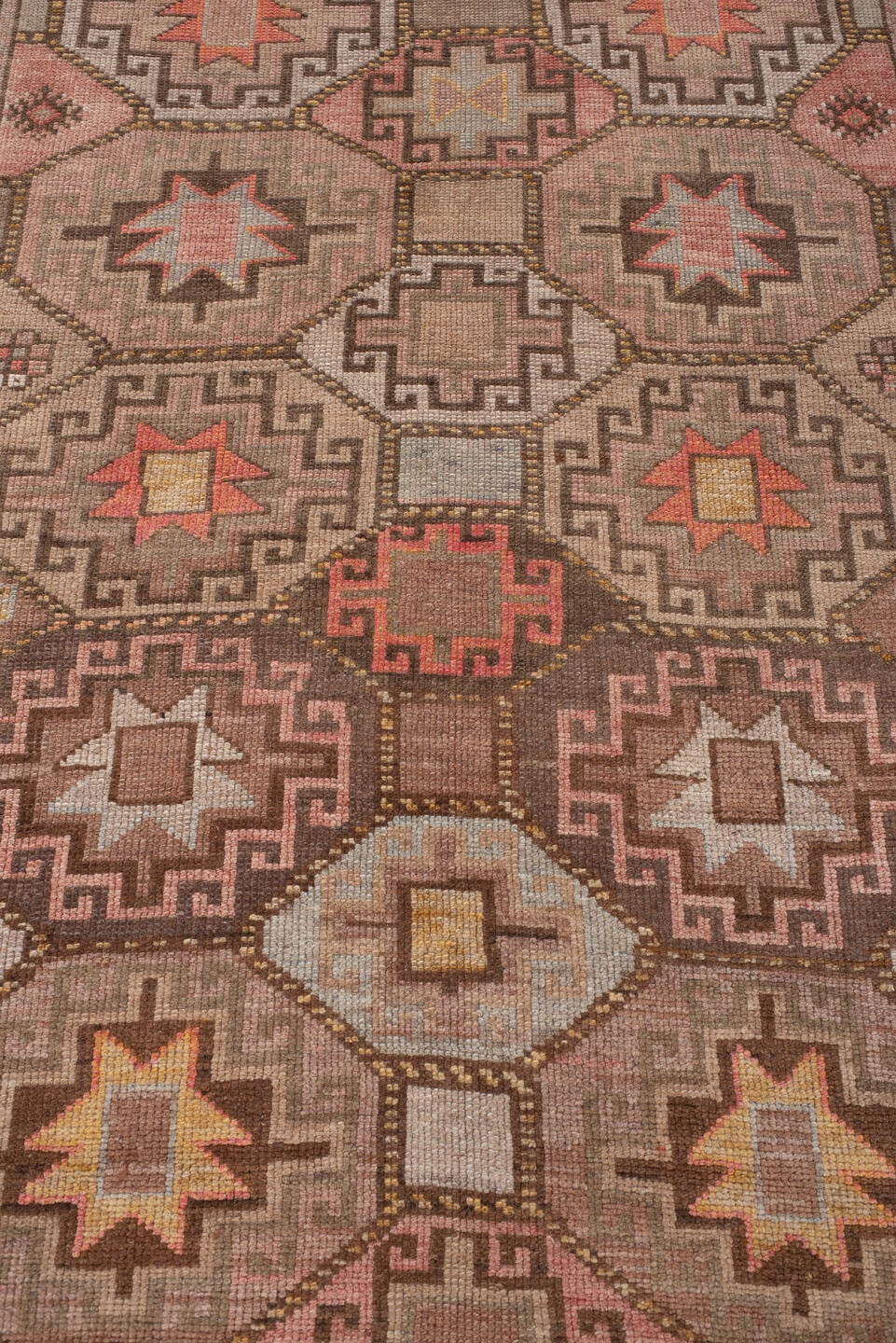 4' x 11' one-of-a-kind handmade antique Anatolian runner rug. Color palette: camel, taupe, rose, rust, charcoal, ivory