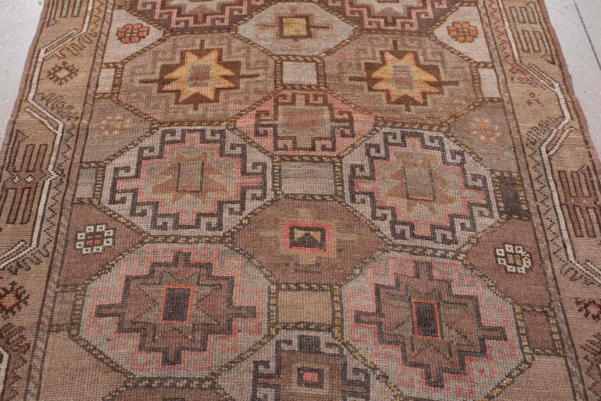 4' x 11' one-of-a-kind handmade antique Anatolian runner rug. Color palette: camel, taupe, rose, rust, charcoal, ivory