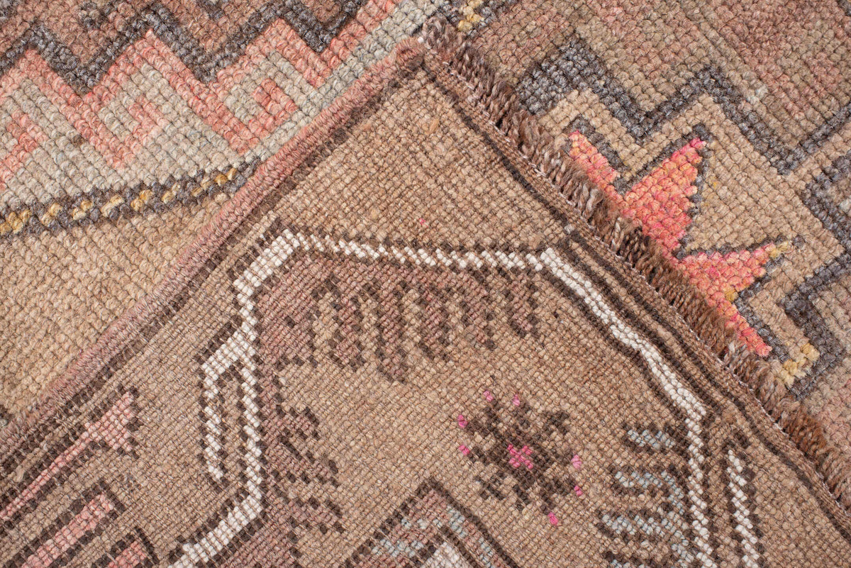 4' x 11' one-of-a-kind handmade antique Anatolian runner rug. Color palette: camel, taupe, rose, rust, charcoal, ivory