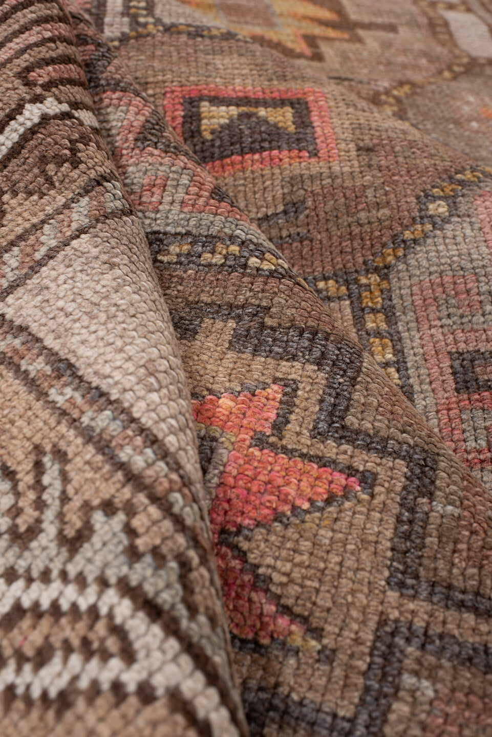 4' x 11' one-of-a-kind handmade antique Anatolian runner rug. Color palette: camel, taupe, rose, rust, charcoal, ivory