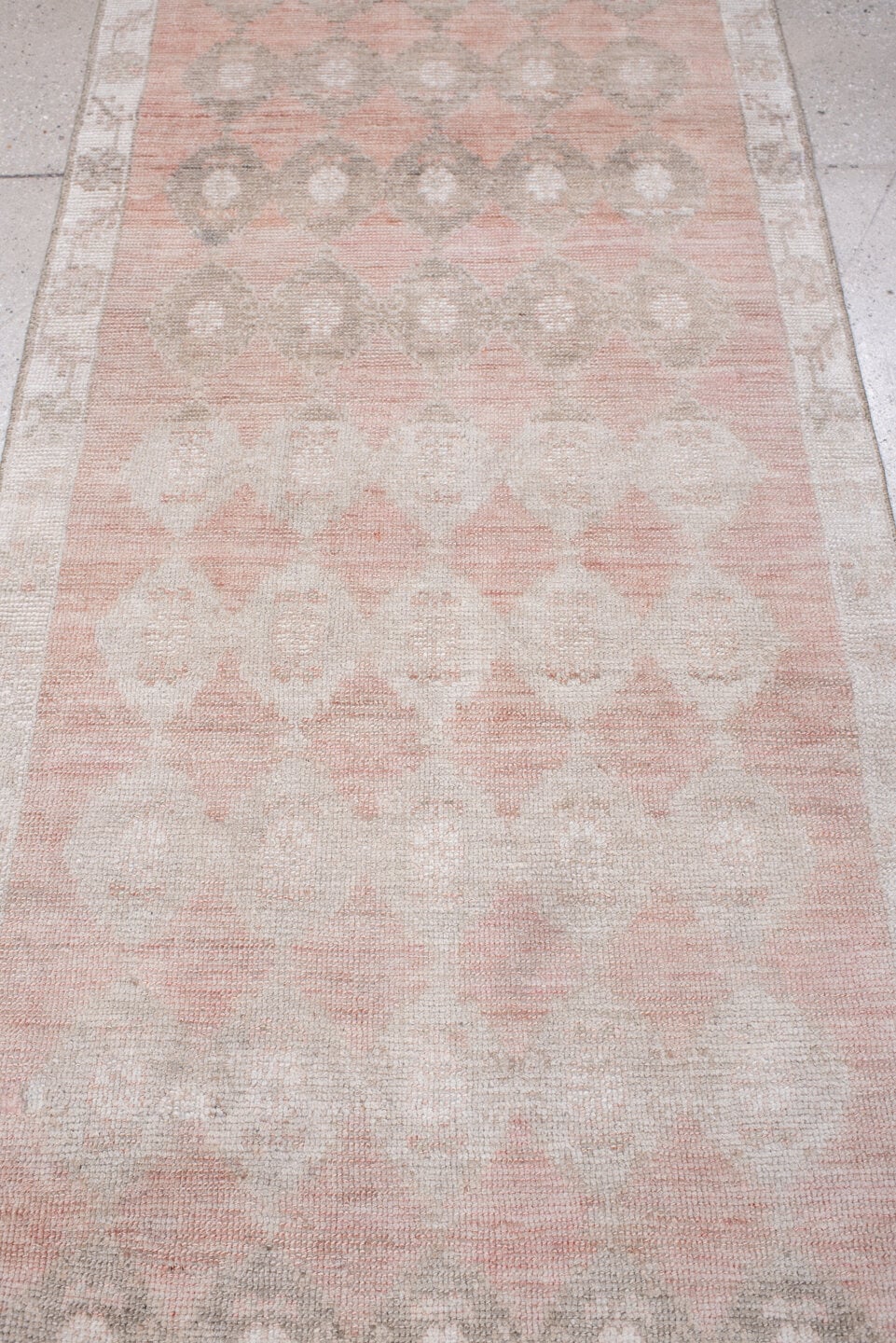 2' x 9' one-of-a-kind handmade antique Anatolian runner rug. Color palette: blush, ivory, taupe, warm gray, sand, rose