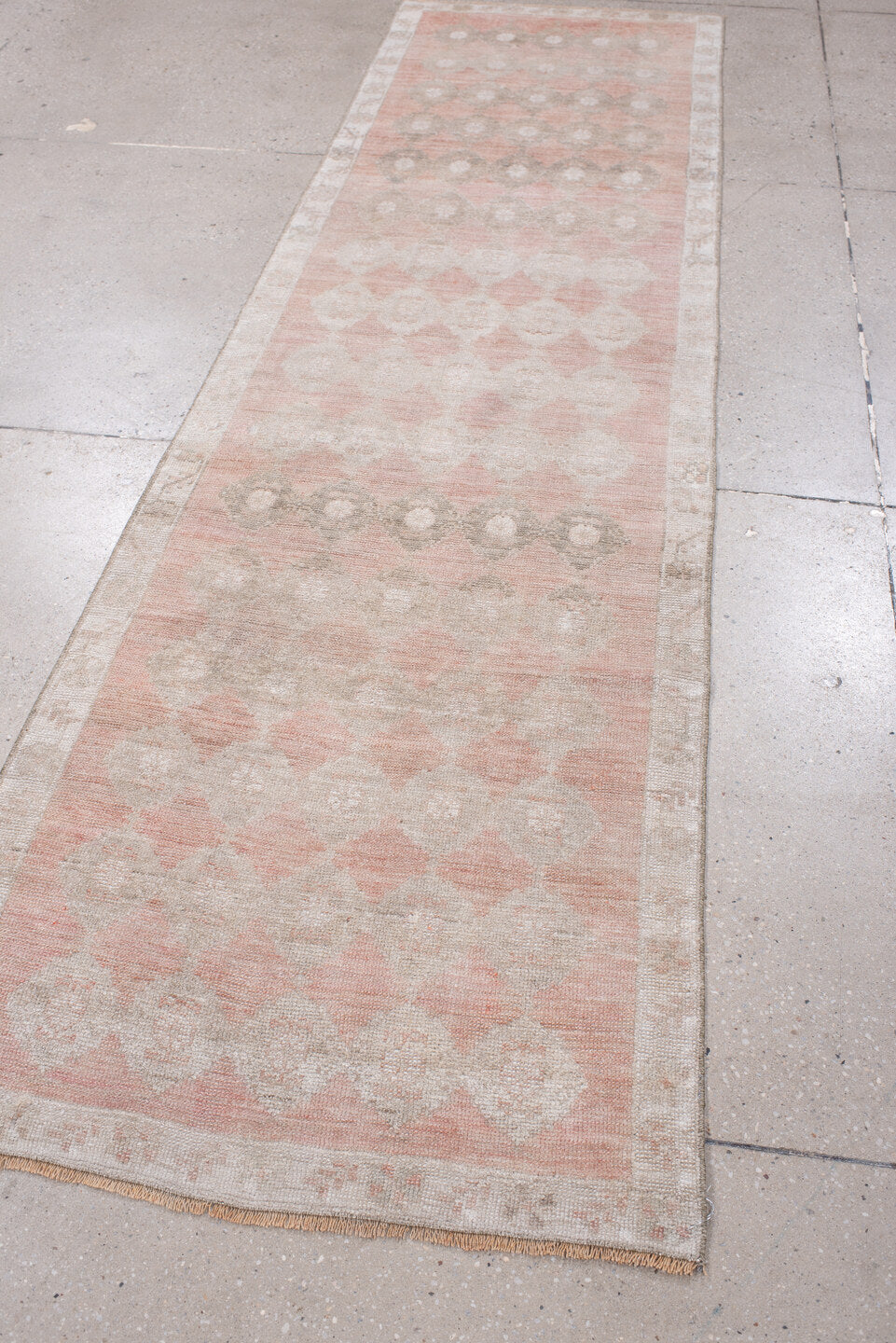 2' x 9' one-of-a-kind handmade antique Anatolian runner rug. Color palette: blush, ivory, taupe, warm gray, sand, rose