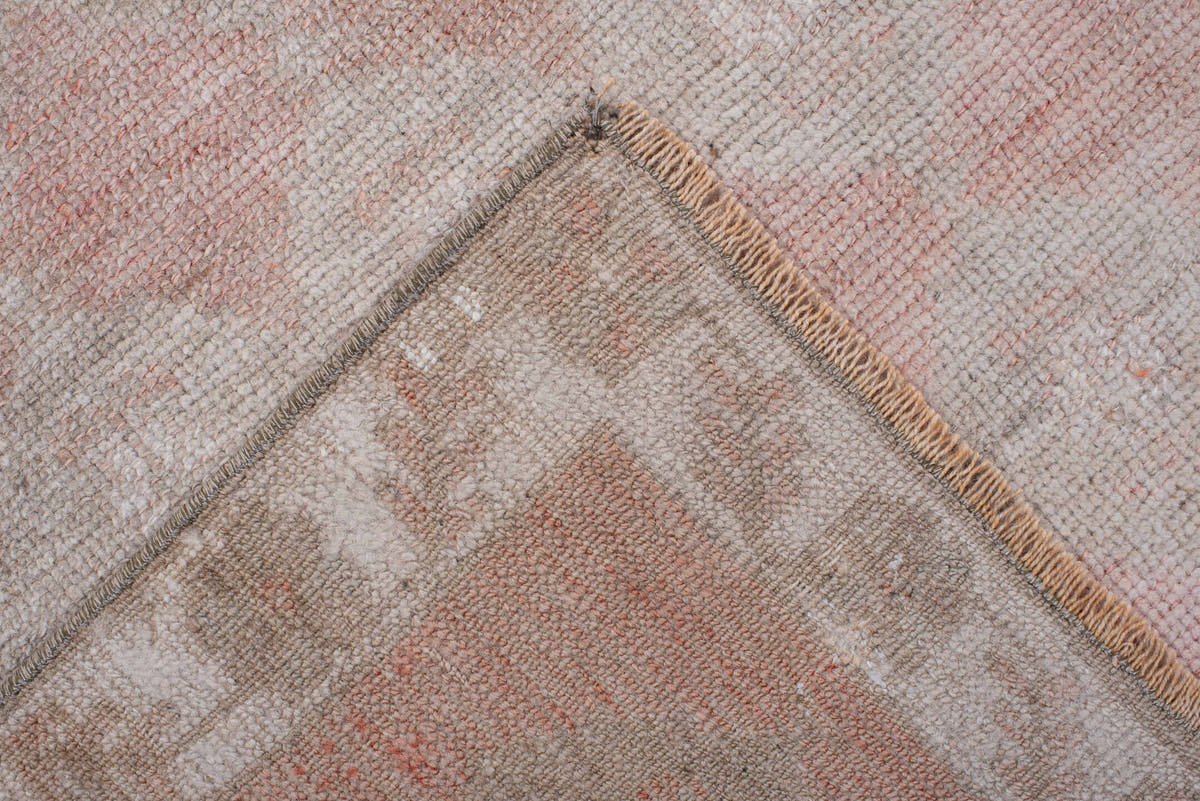 2' x 9' one-of-a-kind handmade antique Anatolian runner rug. Color palette: blush, ivory, taupe, warm gray, sand, rose