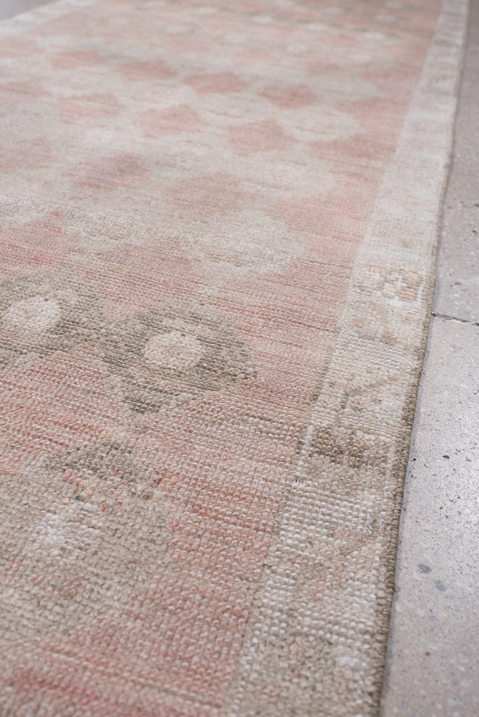 2' x 9' one-of-a-kind handmade antique Anatolian runner rug. Color palette: blush, ivory, taupe, warm gray, sand, rose