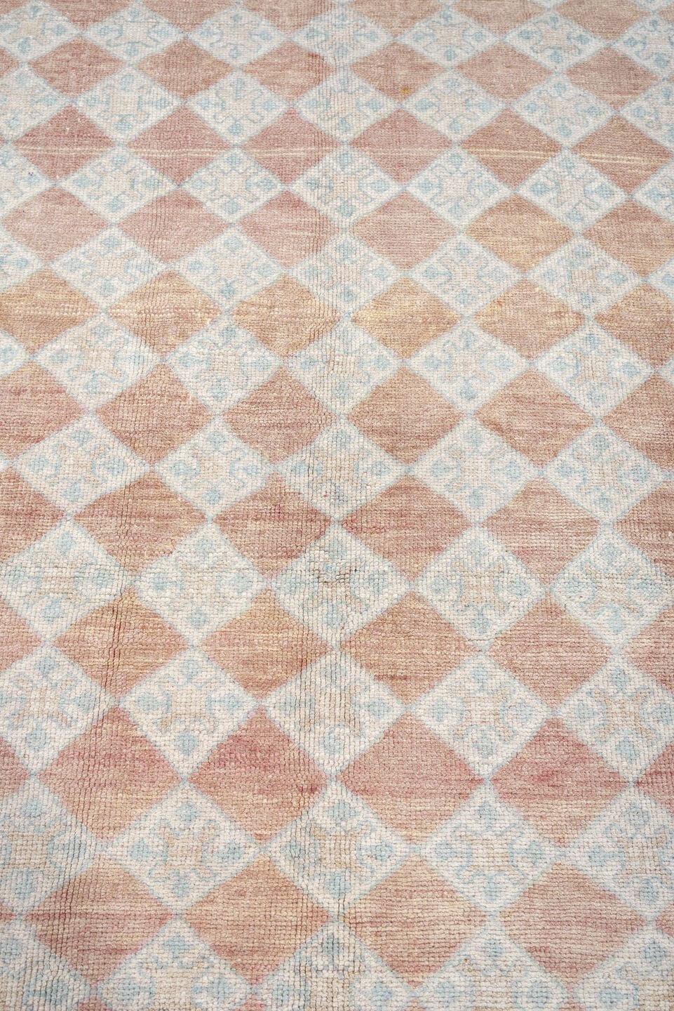 6' x 8' one-of-a-kind handmade antique Anatolian medium size rug. Color palette: terracotta, ivory, pale blue, blush, taupe