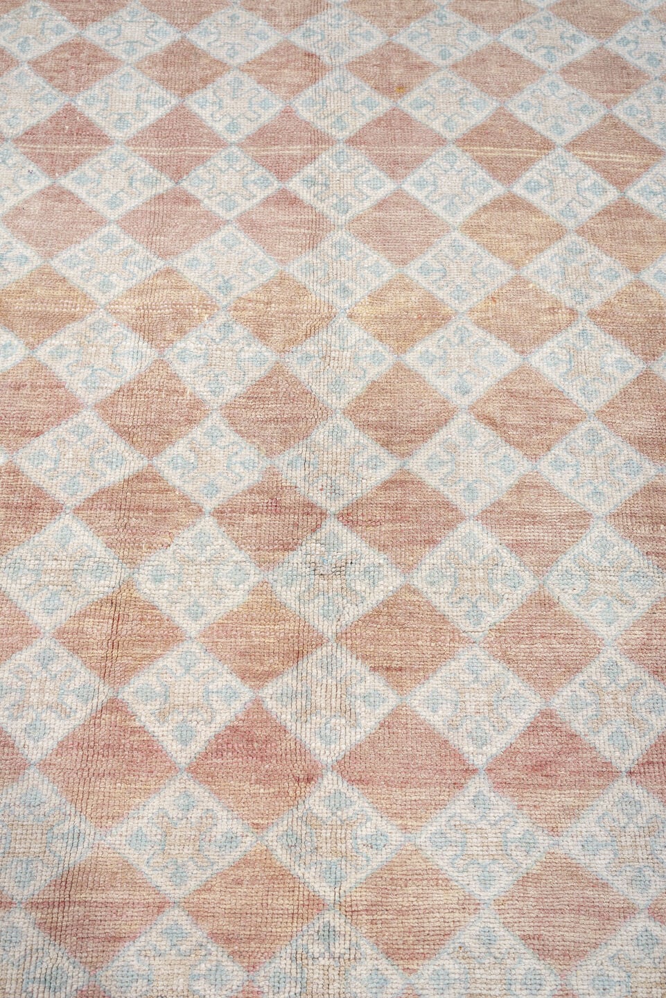 6' x 8' one-of-a-kind handmade antique Anatolian medium size rug. Color palette: terracotta, ivory, pale blue, blush, taupe