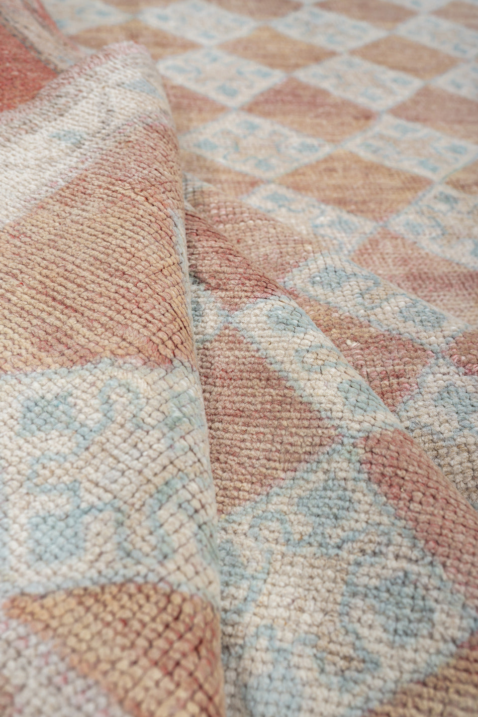 6' x 8' one-of-a-kind handmade antique Anatolian medium size rug. Color palette: terracotta, ivory, pale blue, blush, taupe