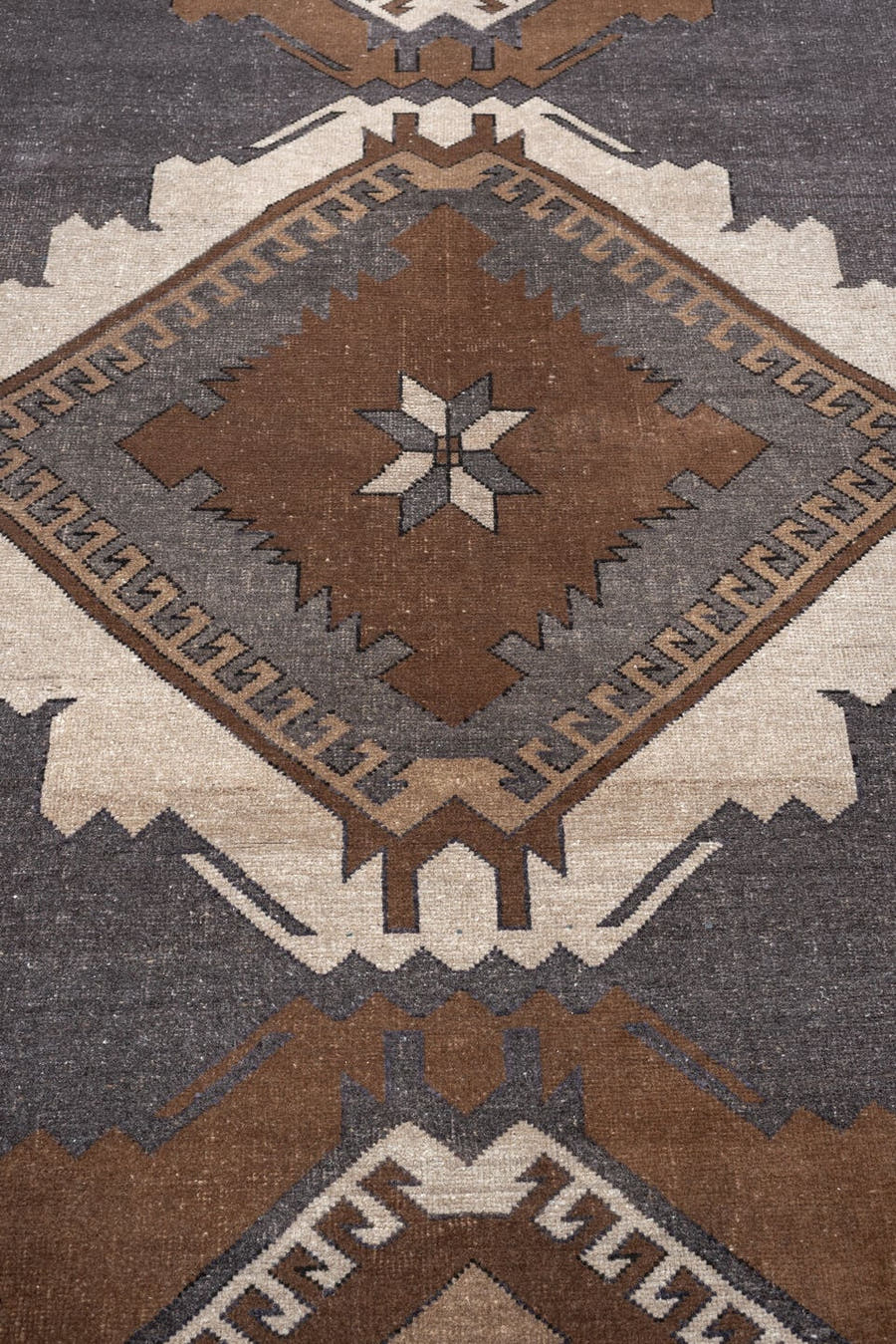 3' x 11' one-of-a-kind handmade antique Kars runner rug. Color palette: charcoal, rust, ivory, camel, taupe, ebony, black
