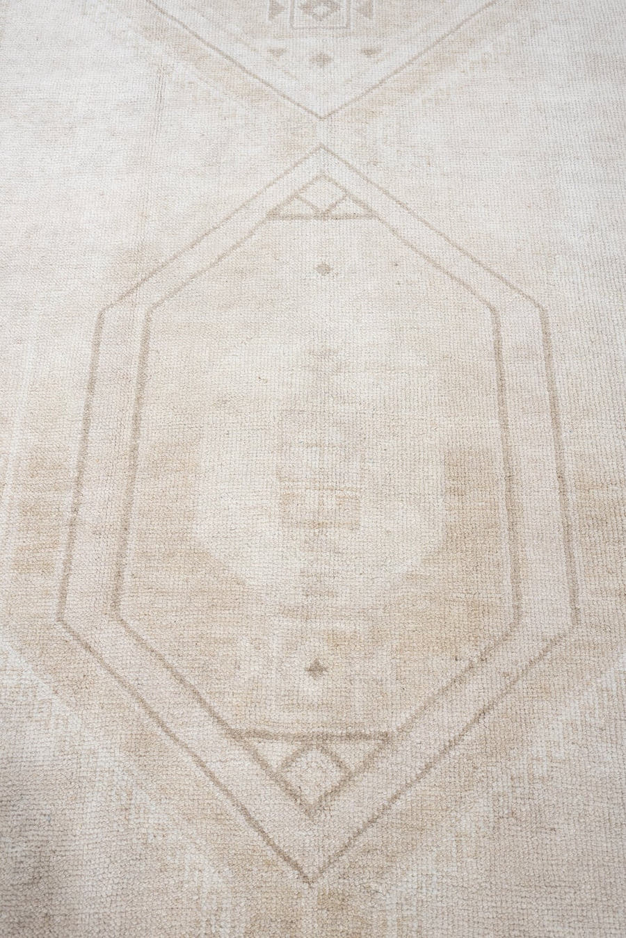 4' x 11' one-of-a-kind handmade antique Anatolian runner rug. Color palette: ivory, cream, taupe, beige, sand, camel, gray